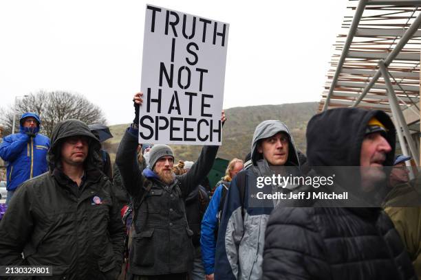 Protesters demonstrate outside the Scottish Parliament as Scotland’s Hate Crime Law comes into force on April 01, 2024 in Edinburgh, Scotland. The...