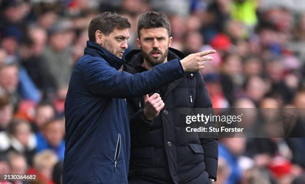 Middlesbrough head coach Michael Carrick in discussion with assistant Jonathan Woodgate during the Sky Bet Championship match between Middlesbrough...