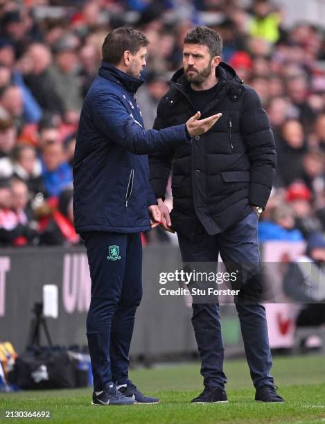 Middlesbrough head coach Michael Carrick in discussion with assistant Jonathan Woodgate during the Sky Bet Championship match between Middlesbrough...