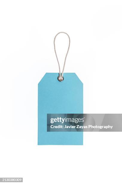 blue paper price label with rope isolated on white - étiqueter photos et images de collection