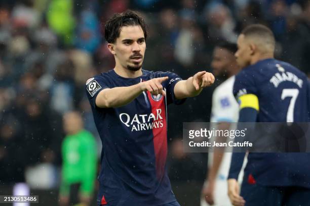 Vitinha of PSG celebrates his goal during the Ligue 1 Uber Eats match between Olympique de Marseille and Paris Saint-Germain at Stade Velodrome on...