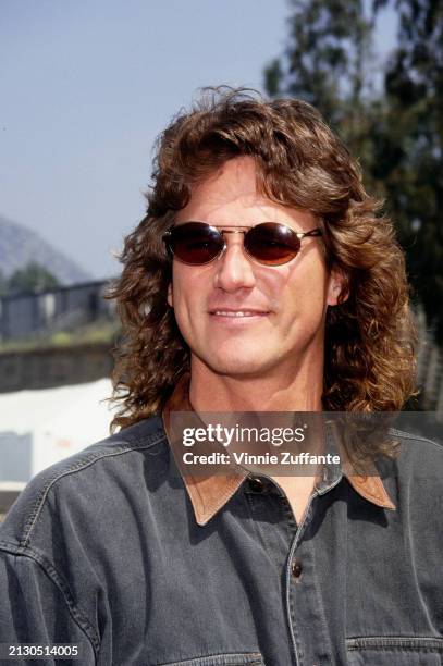 American singer, songwriter and musician Billy Dean, wearing a denim shirt with a brown collar and sunglasses, attends rehearsals for the 29th Annual...