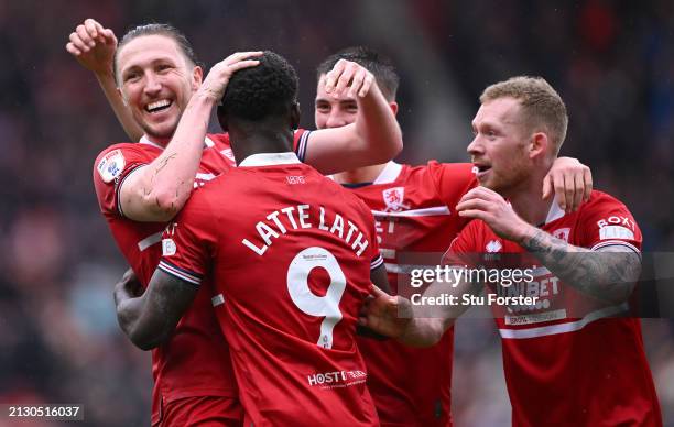 Middlesbrough striker Emmanuel Latte Lath is congratulated by Luke Ayling and team mates after scoring the first goal during the Sky Bet Championship...