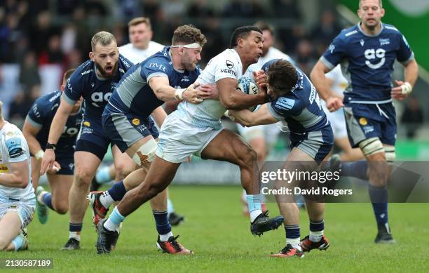 Immanuel Feyi-Waboso of Exeter Chiefs is tackled by Raffi Quirke during the Gallagher Premiership Rugby match between Sale Sharks and Exeter Chiefs...