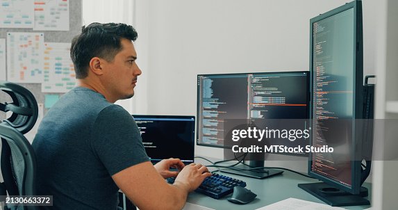 Young Man Software Developers Using Computer To Write Code Application ...