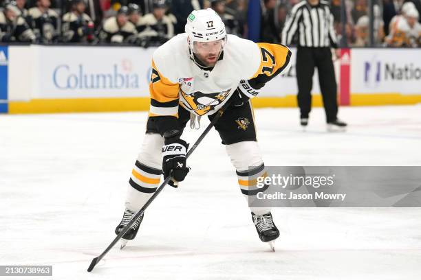 Bryan Rust of the Pittsburgh Penguins takes a break during a stoppage in play against the Columbus Blue Jackets at Nationwide Arena on March 30, 2024...