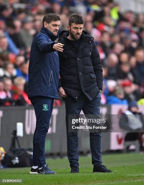 Middlesbrough head coach Michael Carrick in discussion with assistant Jonathan Woodgate during the Sky Bet Championship match between Middlesbrough...