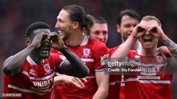 Middlesbrough striker Emmanuel Latte Lath and team mates celebrate after scoring the first goal during the Sky Bet Championship match between...