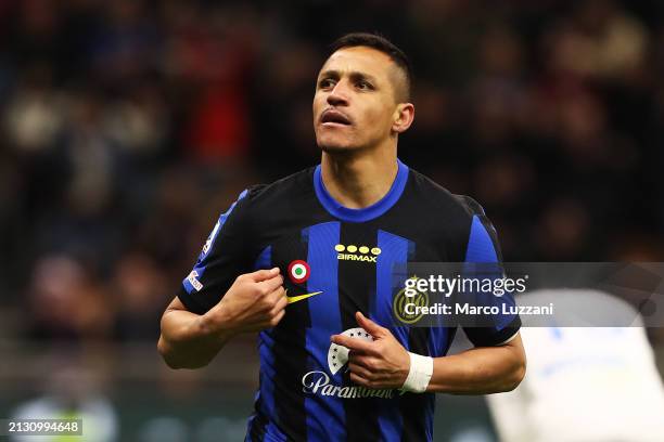 Alexis Sanchez of FC Internazionale celebrates scoring his team's second goal during the Serie A TIM match between FC Internazionale and Empoli FC at...