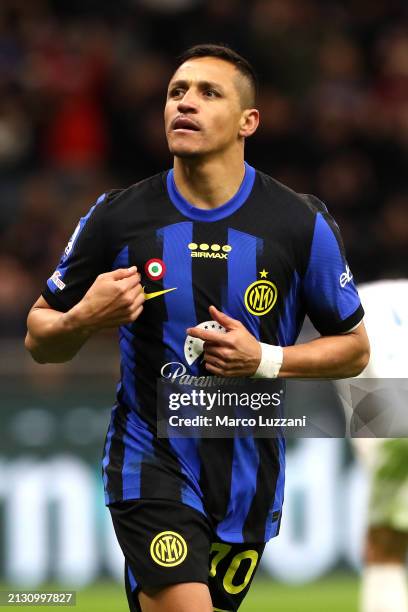Alexis Sanchez of FC Internazionale celebrates scoring his team's second goal during the Serie A TIM match between FC Internazionale and Empoli FC at...