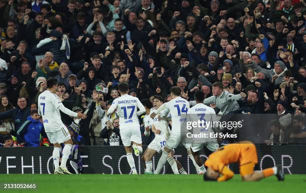 Daniel James of Leeds United celebrates scoring his team's third goal with teammates during the Sky Bet Championship match between Leeds United and...