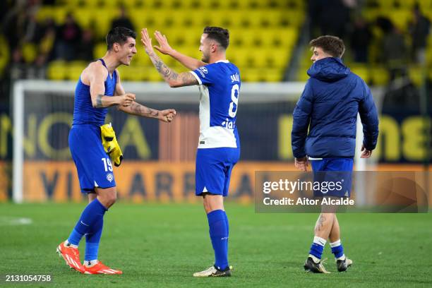 Alvaro Morata and Saul Niguez of Atletico Madrid celebrate victory in the LaLiga EA Sports match between Villarreal CF and Atletico Madrid at Estadio...