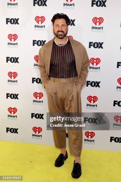 Maksim Chmerkovskiy attends the 2024 iHeartRadio Music Awards at Dolby Theatre in Los Angeles, California on April 01, 2024. Broadcasted live on FOX.