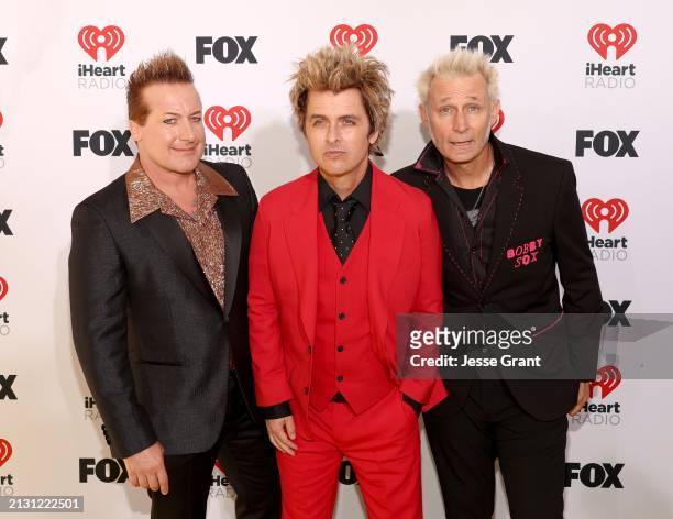 Tré Cool, Billie Joe Armstrong and Mike Dirnt of Green Day attend the 2024 iHeartRadio Music Awards at Dolby Theatre in Los Angeles, California on...
