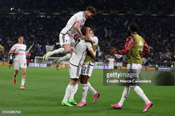 Federico Chiesa of Juventus Fc celebrates with his team mates after scoring a goal during the Coppa Italia semi-final first leg match between...