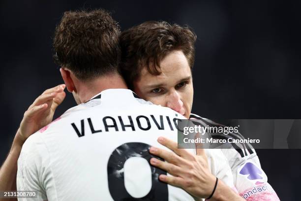 Federico Chiesa of Juventus Fc celebrates with his team mate Dusan Vlahovic of Juventus Fc after scoring a goal during the Coppa Italia semi-final...