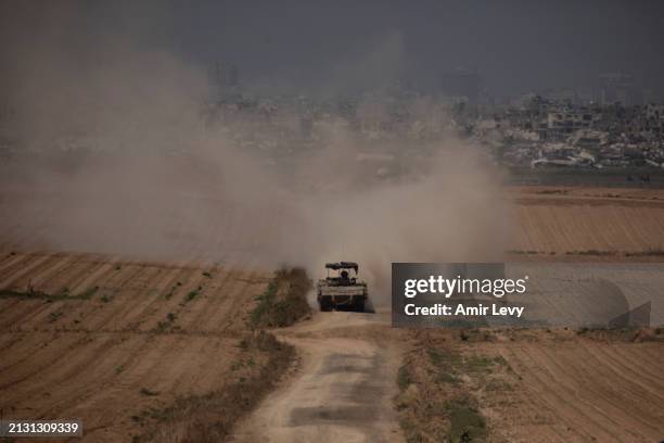 An Israeli armored personnel carrier moves along the border with the Gaza Strip on April 4, 2024 in Southern Israel, Israel. Israeli officials...