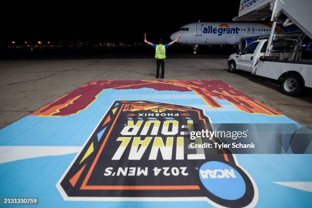 The UConn Huskies arrive at Jackson Jet Center in Phoenix, Arizona, on April 4 ahead of the 2024 Men's Final Four.