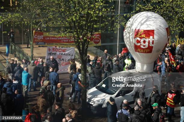 Transportation industry workers gather to stage demonstration within the strike call of the Confederation Generale du Travail strike today in Paris,...