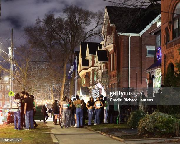 March 15 Party goes are seen in front of a frat house on Madison Avenue n honour of St. Patrick's Day. University of Toronto Fraternities are seen in...