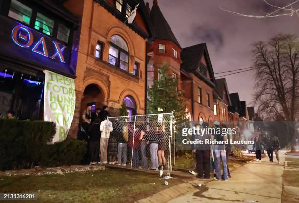 March 15 Party goes are seen in front of a frat house on Madison Avenue n honour of St. Patrick's Day.University of Toronto Fraternities are seen in...
