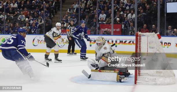 Toronto Maple Leafs right wing Ryan Reaves scores his third goal of the year on Vegas Golden Knights goaltender Adin Hill as the Toronto Maple Leafs...