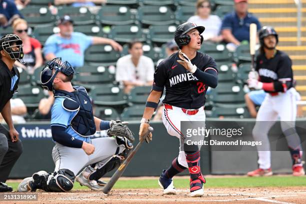 Brooks Lee of the Minnesota Twins bats during the first inning of a spring training Spring Breakout game against the Tampa Bay Rays at Hammond...