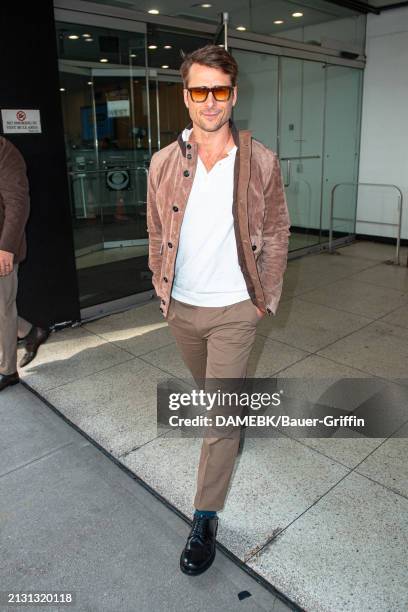 Glen Powell is seen exiting 'The Drew Barrymore Show' on April 04, 2024 in New York City.