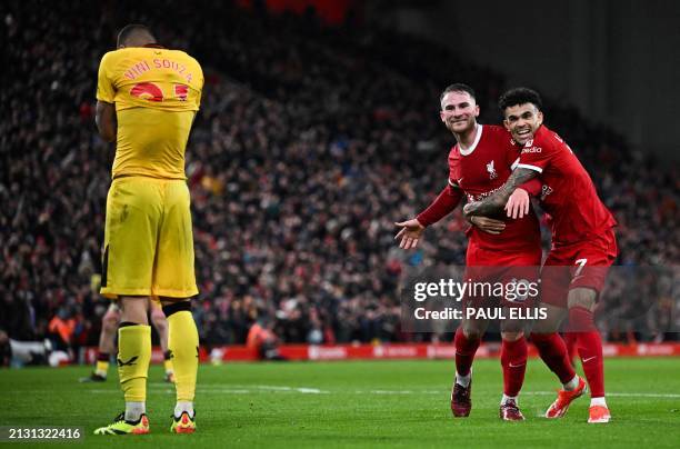 Liverpool's Argentinian midfielder Alexis Mac Allister celebrates with Liverpool's Colombian midfielder Luis Diaz after scoring his team second goal...
