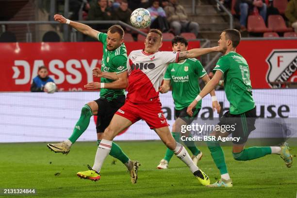 Lennart Thy of PEC Zwolle, Jens Toornstra of FC Utrecht, Thomas Lam of PEC Zwolle during the Dutch Eredivisie match between FC Utrecht and PEC Zwolle...