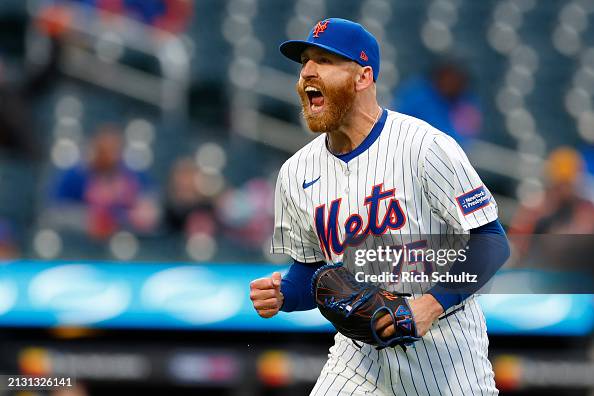 Garret Reed Reed Garrett of the New York Mets reacts after striking out Zach ...