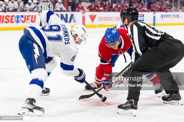 Steven Stamkos of the Tampa Bay Lightning faces off Brendan Gallagher of the Montreal Canadiens during the first period of the NHL regular season...