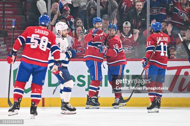 Joel Armia of the Montreal Canadiens celebrates his goal with teammate Alex Newhook during the first period against the Tampa Bay Lightning at the...