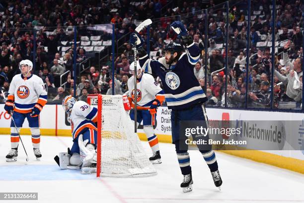 Kirill Marchenko of the Columbus Blue Jackets reacts after scoring a goal during the first period of a game against the New York Islanders at...