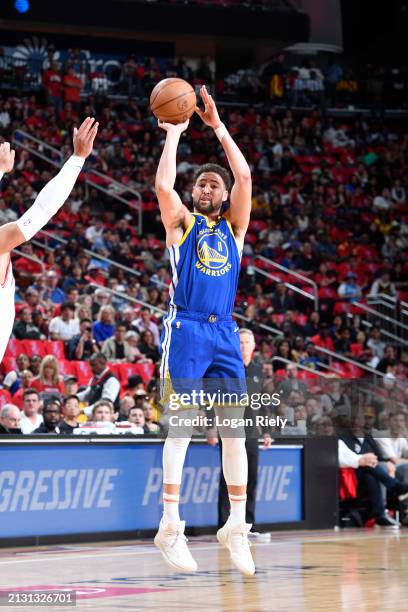 Klay Thompson of the Golden State Warriors shoots a three point basket during the game against the Houston Rockets on April 4, 2024 at the Toyota...
