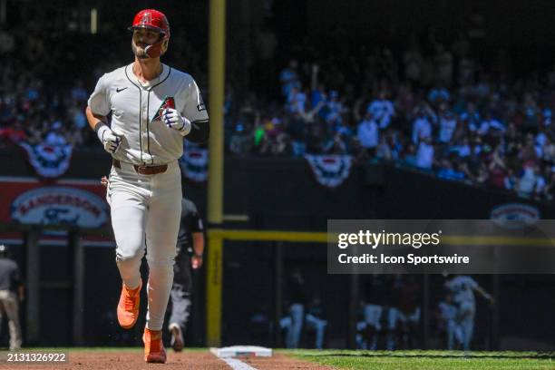 Arizona Diamondbacks infielder Blaze Alexander rounds the bases after hitting a solo home run during the second inning of a MLB game between the...