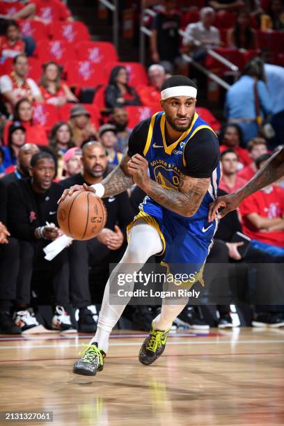 Gary Payton II of the Golden State Warriors drives to the basket during the game against the Houston Rockets on April 4, 2024 at the Toyota Center in...