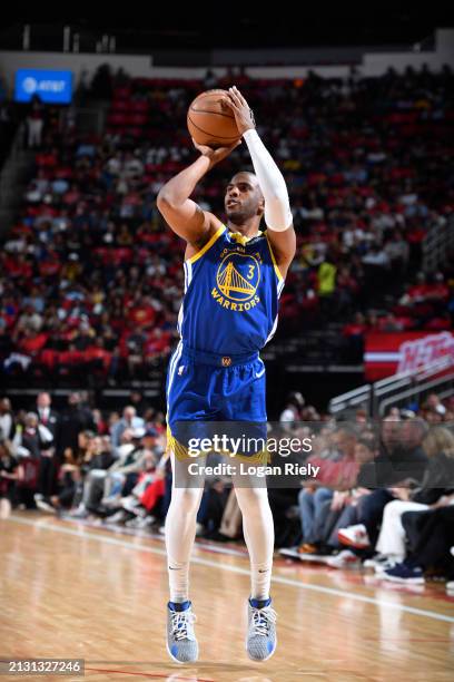 Chris Paul of the Golden State Warriors shoots a three point basket during the game against the Houston Rockets on April 4, 2024 at the Toyota Center...