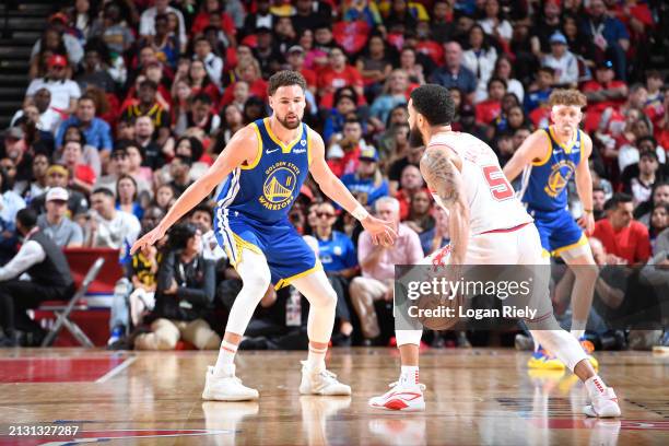 Klay Thompson of the Golden State Warriors plays defense against Fred VanVleet of the Houston Rockets during the game on April 4, 2024 at the Toyota...