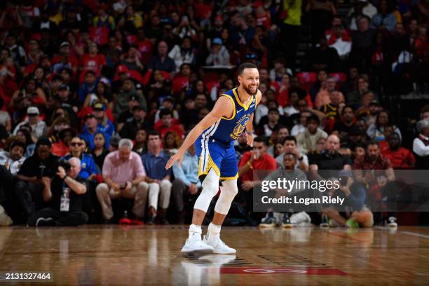 Stephen Curry of the Golden State Warriors smiles during the game against the Houston Rockets on April 4, 2024 at the Toyota Center in Houston,...