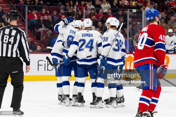 Steven Stamkos of the Tampa Bay Lightning celebrates a goal with his teammates during the second period of the NHL regular season game between the...