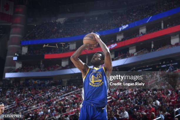 Andrew Wiggins of the Golden State Warriors shoots a three point basket during the game against the Houston Rockets on April 4, 2024 at the Toyota...