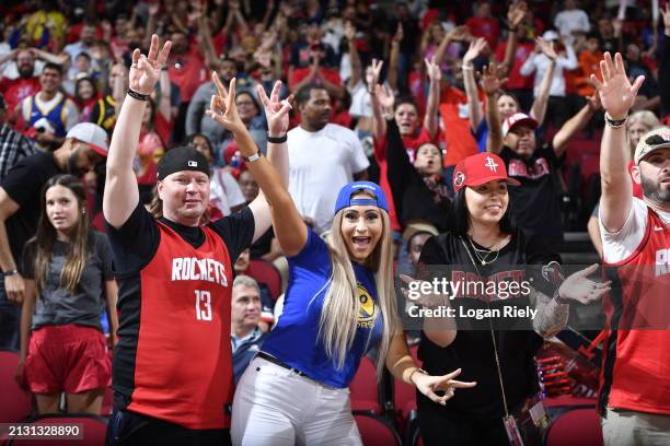Fans stand for a t-shirt toss during the game on April 4, 2024 at the Toyota Center in Houston, Texas. NOTE TO USER: User expressly acknowledges and...