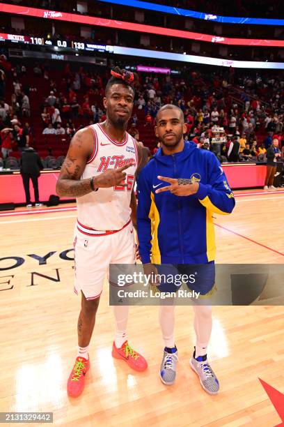 Reggie Bullock Jr. #25 of the Houston Rockets and Chris Paul of the Golden State Warriors pose for a portrait after the game on April 4, 2024 at the...
