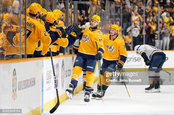 Mark Jankowski of the Nashville Predators celebrates his empty net goal against the St. Louis Blues during an NHL game at Bridgestone Arena on April...