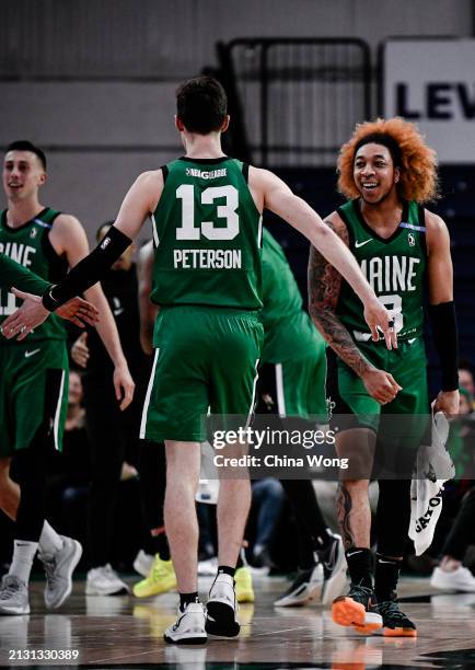 April 04: Drew Peterson of the Maine Celtics celebrates during the 2023-24 G League Playoff game with JD Davison against the Delaware Blue Coats on...