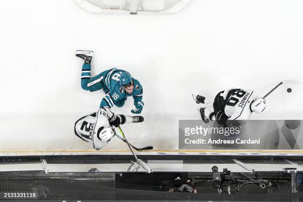 An overhead shot of Filip Zadina of the San Jose Sharks taking a high stick to the face against the Los Angeles Kings at SAP Center on April 4, 2024...