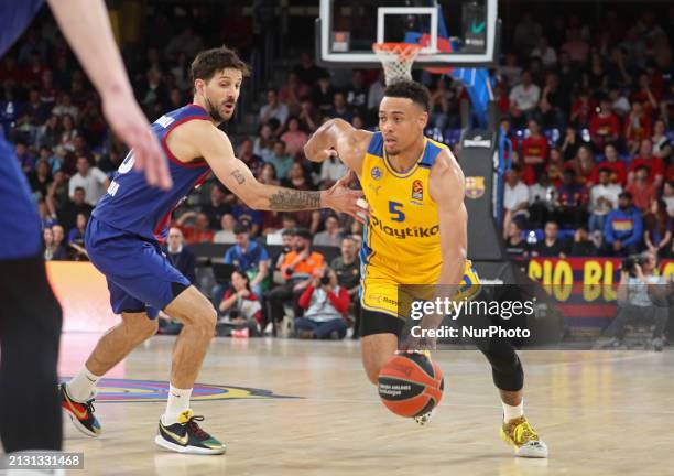 Wade Baldwin IV and Nicolas Laprovittola are playing during the match between FC Barcelona and Maccabi Playtika Tel Aviv for week 33 of the Turkish...