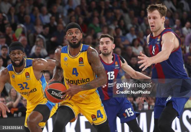 Lorenzo Brown and Jan Vesely are playing during the match between FC Barcelona and Maccabi Playtika Tel Aviv for week 33 of the Turkish Airlines...