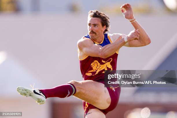 Joe Daniher of the Lions kicks a goal during the 2024 AFL Round 04 match between the Brisbane Lions and the North Melbourne Kangaroos at Norwood Oval...